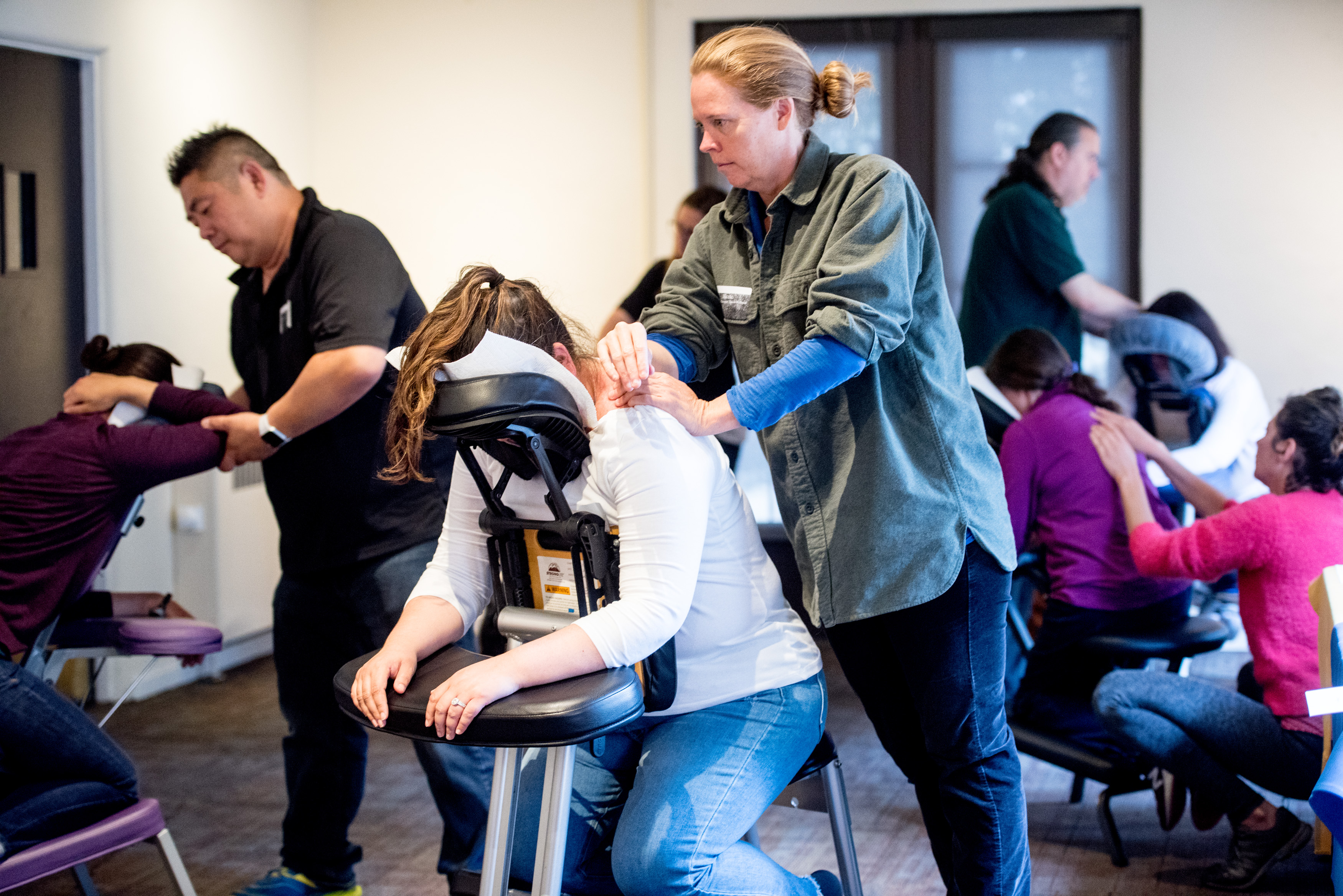 caregivers receive chair massages