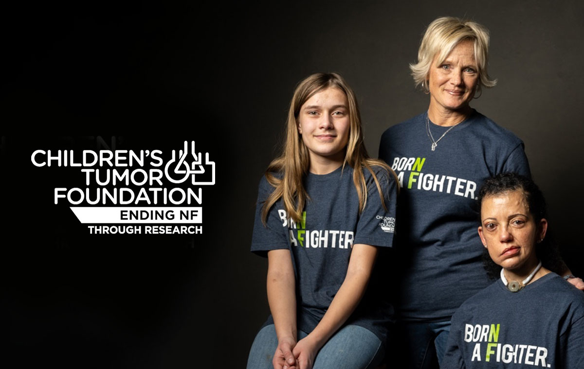 Three people, including a young girl, with gray T-shirts that say Born a Fighter. The logo for the Children's Tumor Foundation is visible to their left.