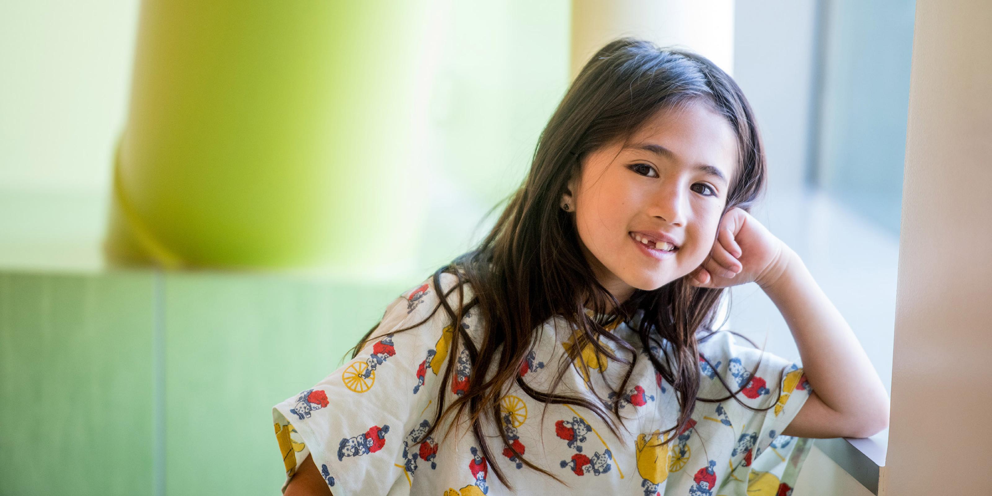 Smiling pediatric patient at the UCSF Brain Tumor Center
