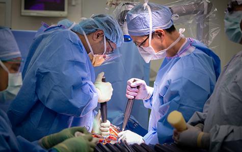 UCSF neurosurgeons Praveen Mummaneni and Dean Chou remove a spinal chordoma